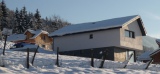 Cette maison de montagne s'adapte parfaitement à l'été comme à l'hiver