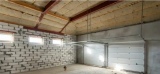 Isolation : comment protéger votre garage des températures glaciales du plafond au sol ?