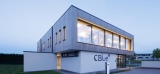 Une entreprise de Mariembourg reçoit un prix à la COP 28 pour un bâtiment construit à Suarlée